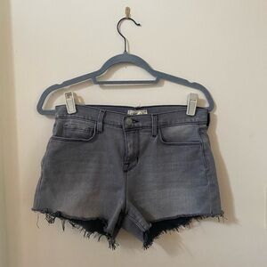 L’AGENCE AUDREY SHORTS MID RISE IN MISTY GRAY RAW HEM DENIM